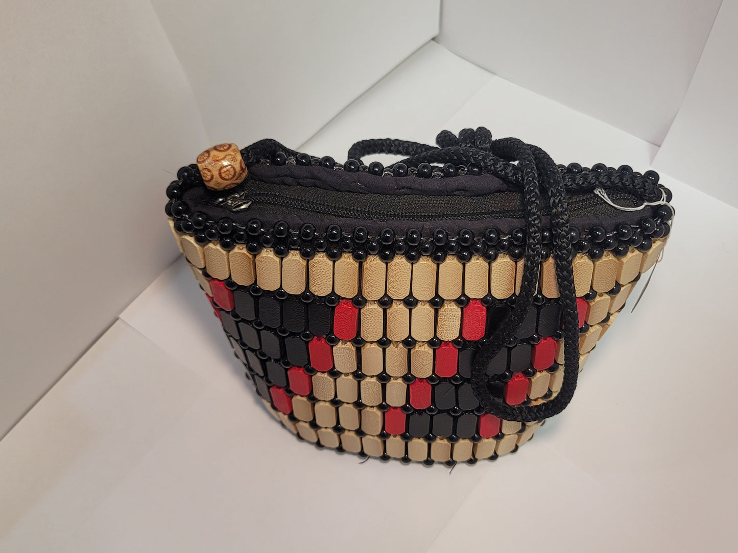 African women's wood art purse